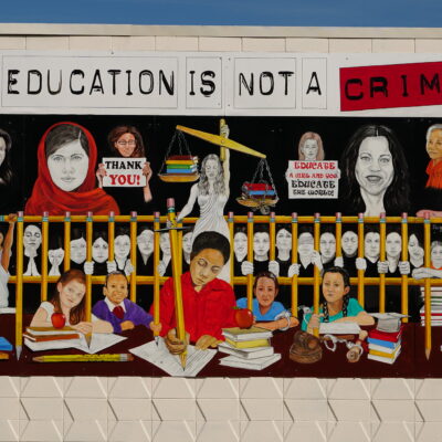 Mural depicting women and children at the Waco Baha'i Center, Texas.
